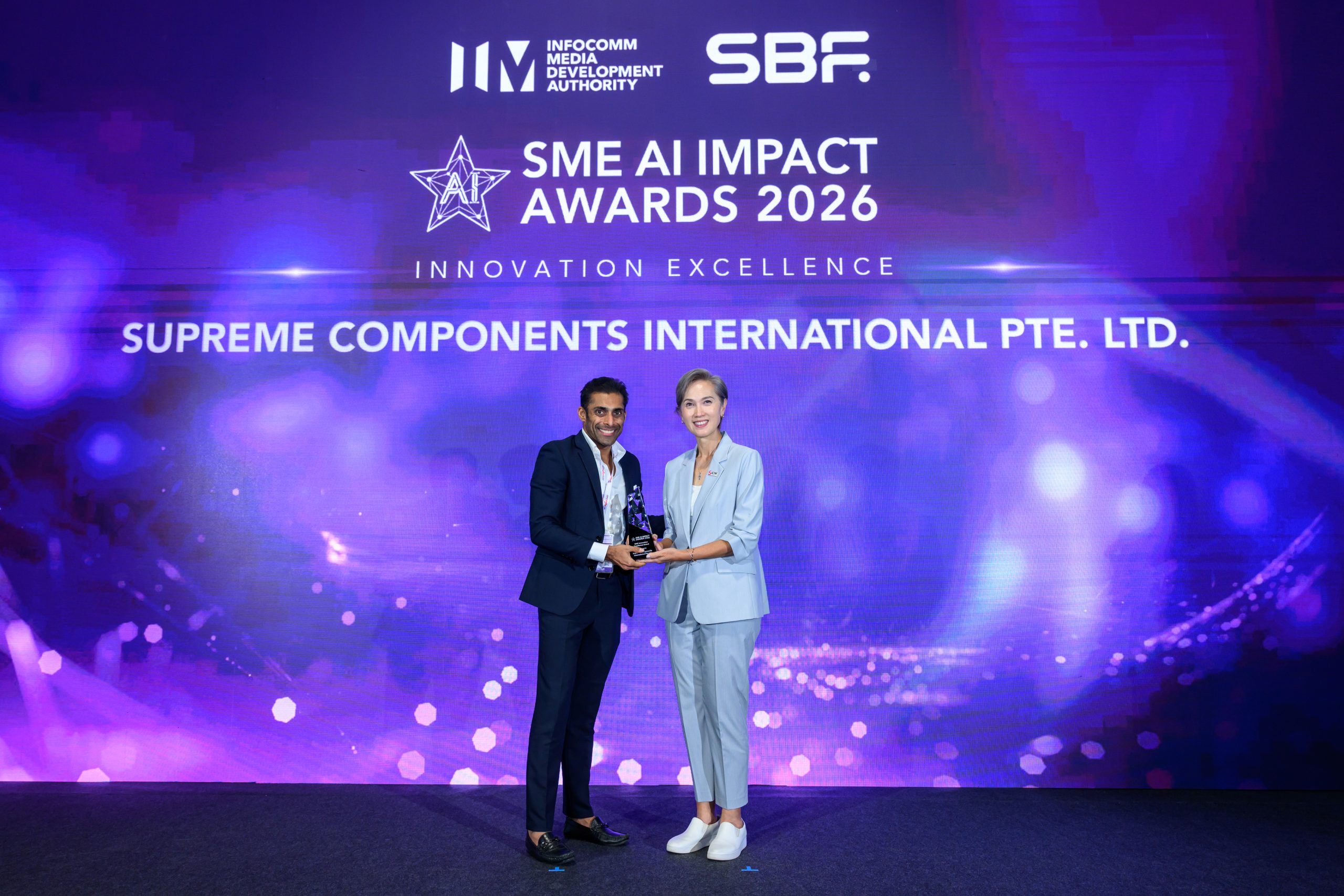 Piyush Aggarwala, VP of Sales and Digital Innovation, receives the SME Innovation Excellence Award on behalf of SCI from Mrs Josephine Teo, Minister for Digital Development and Information